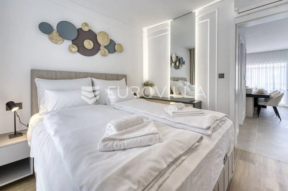 krk, novogradnja u krku, četverosoban dvoetažni stan 136 m² sa wellnessom i bazenom - slika 12