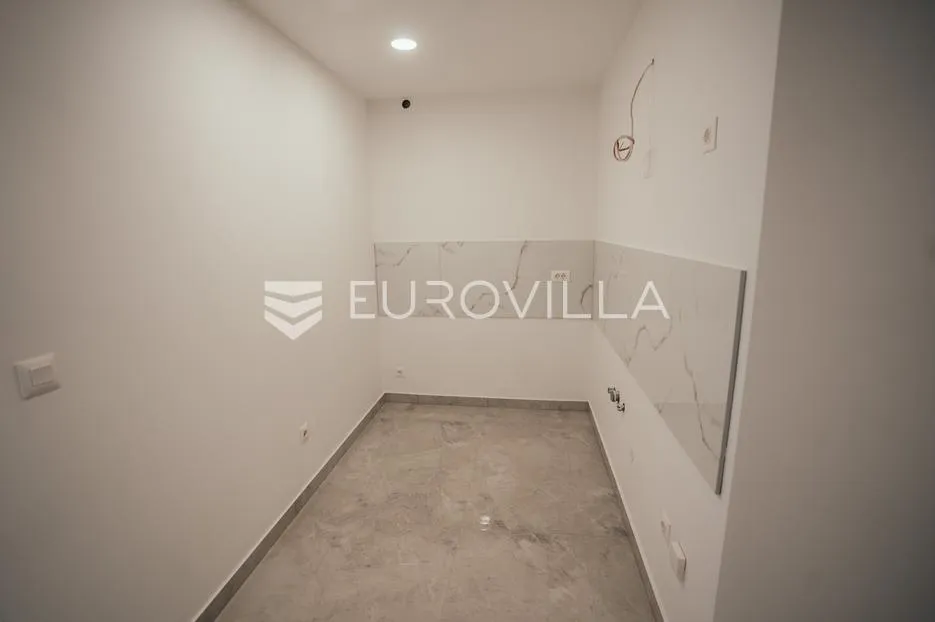 vukovar, centar, novouređen poslovni prostor 106 m², odlična lokacija - slika 10