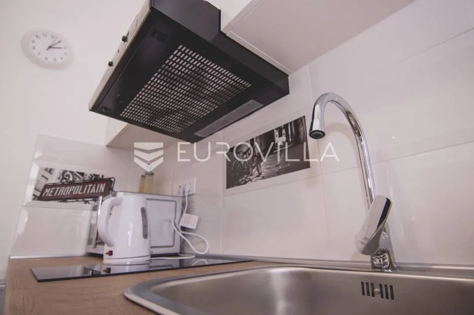 centar stan 205m2 podijeljen na 5 apartmana i sobu - slika 40