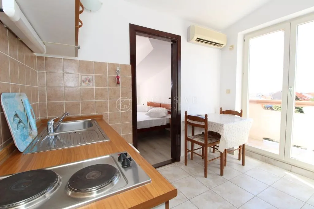 pag, mandre, kuća sa kategoriziranim apartmanima i okućnicom - slika 15