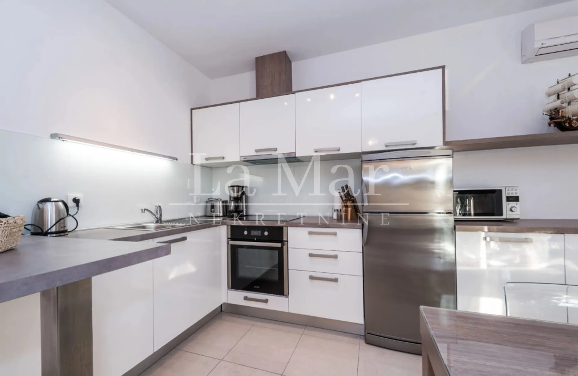 novalja- apartman prvi red do mora- e1 - 77.97m2- prizemlje - slika 12