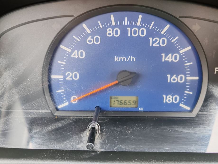 daihatsu cuore 1.0 benzin 2004 god reg 25.10 .2025 - slika 14