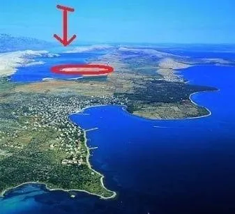 otok pag, kolan, zemljište 67.400m2 uz more - slika 3