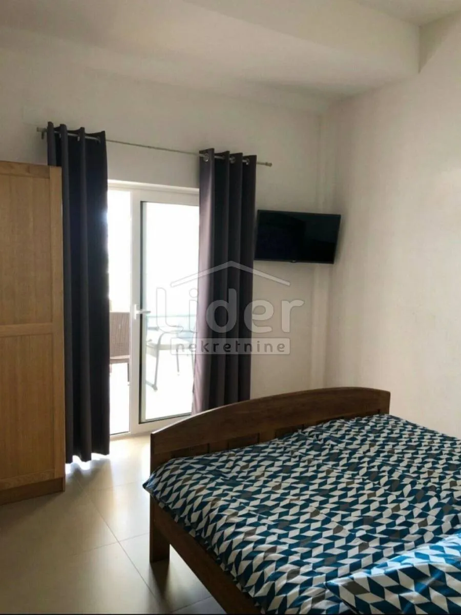 apartmanska kuća na samoj plaži u loparu - slika 13