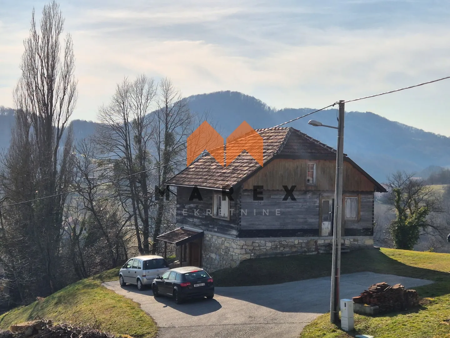prekrasna kameno drvena kuća - slika 8