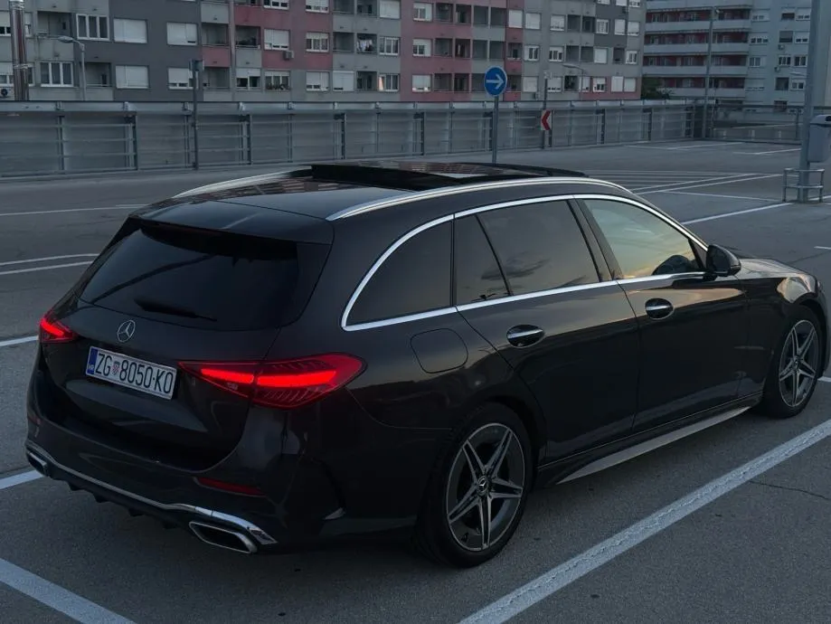 mercedes-benz c200d t amg line *pano, vrhunsko stanje, 2 seta kotača* - slika 5