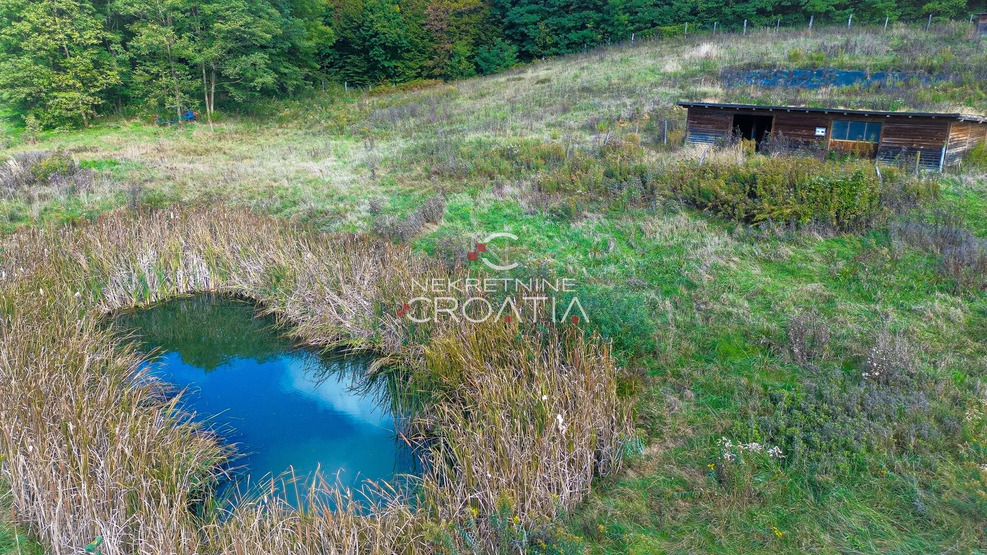 4,5 ha zemljišta + kuća - slika 15