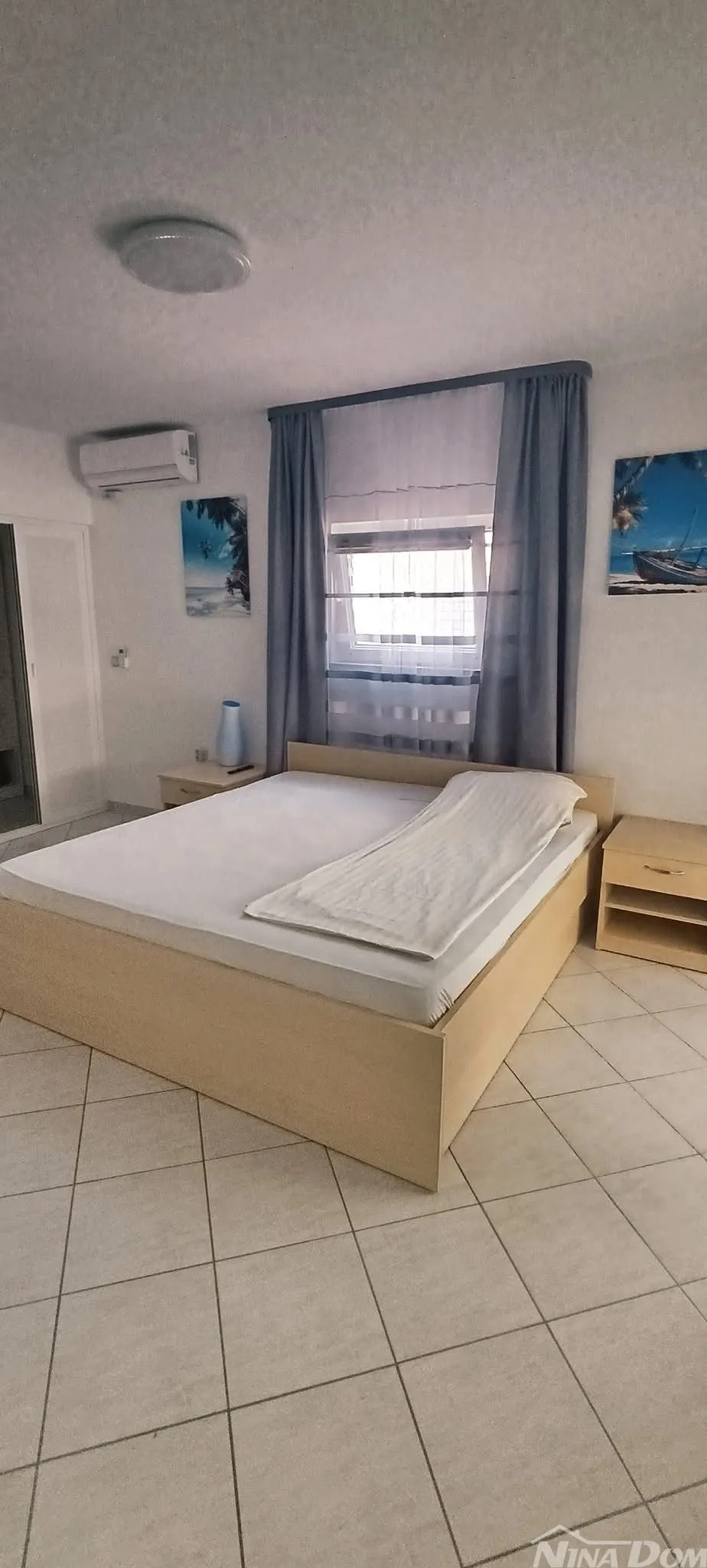 južna strana 90 met.do mora apartmanska kuća s dvorištem - slika 12