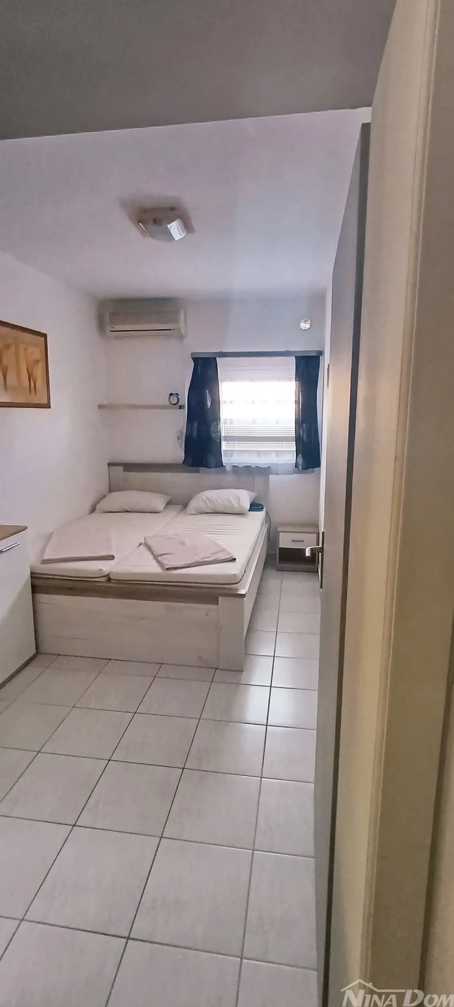 južna strana 90 met.do mora apartmanska kuća s dvorištem - slika 7