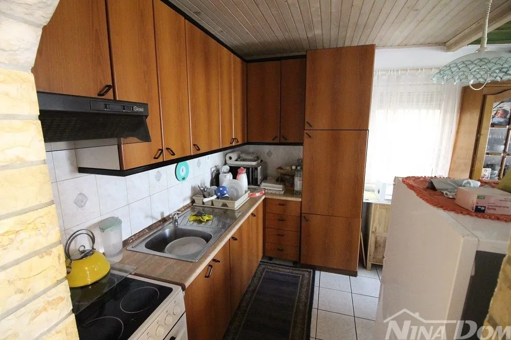 dvojna kuća s dva apartmana 50 metara do mora. - slika 9