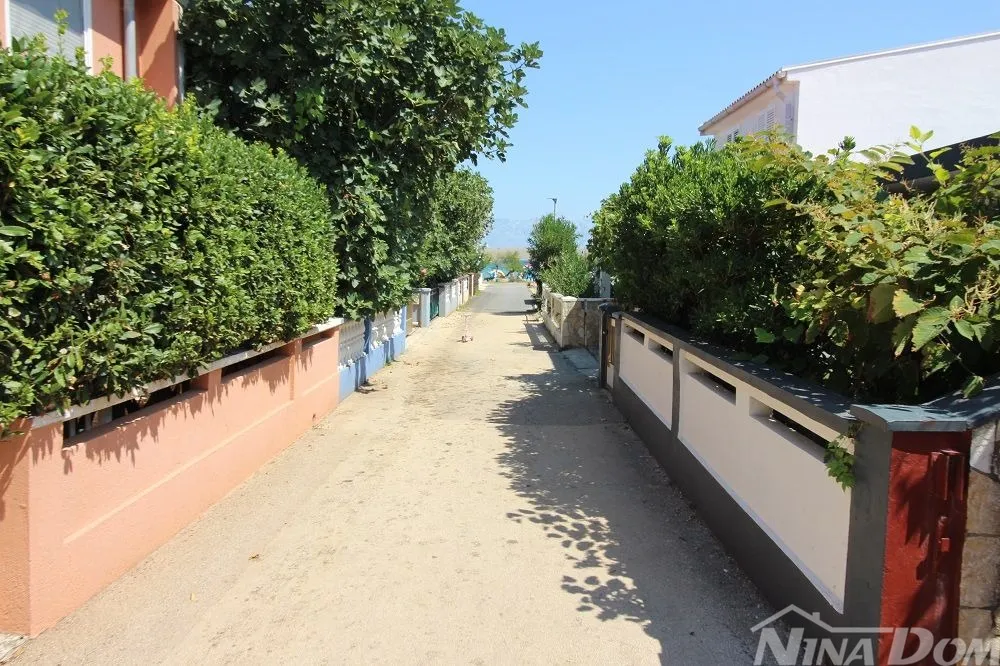 apartmanska kuća s 4 apartmana i građevinskom parcelom 60 met.do mora. - slika 28