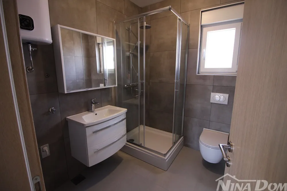 novogradnja s pogledom na more – 76 m² u srcu vira! - slika 8