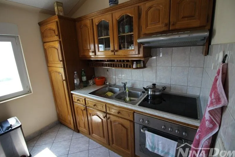 lijepo uređena nekretnina, s dva stana , garaža s okućnicom - slika 31