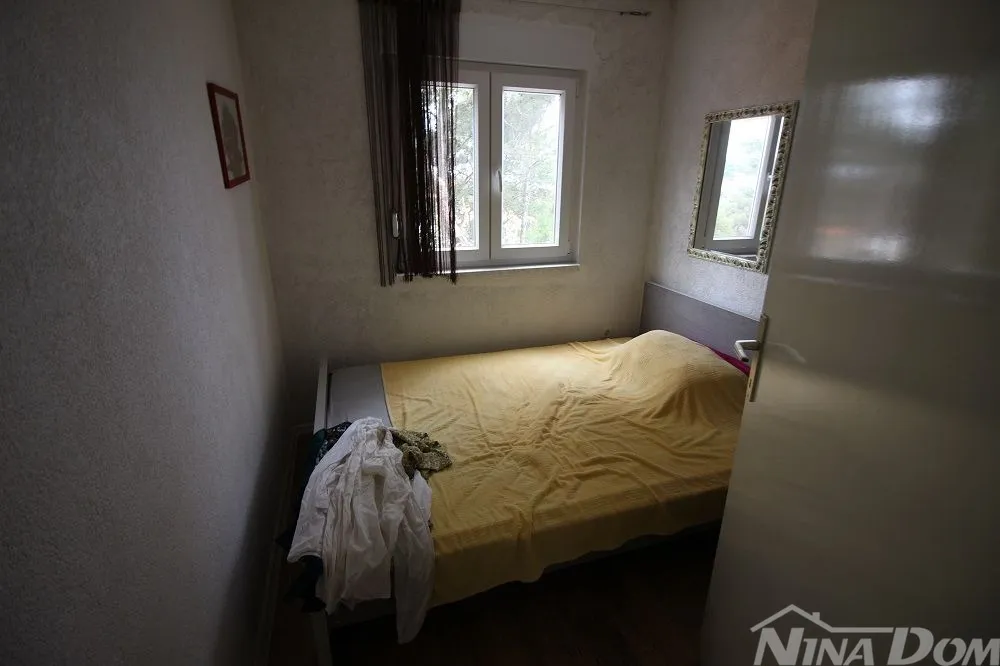 nekretnina u mirnom dijelu naselja - slika 11