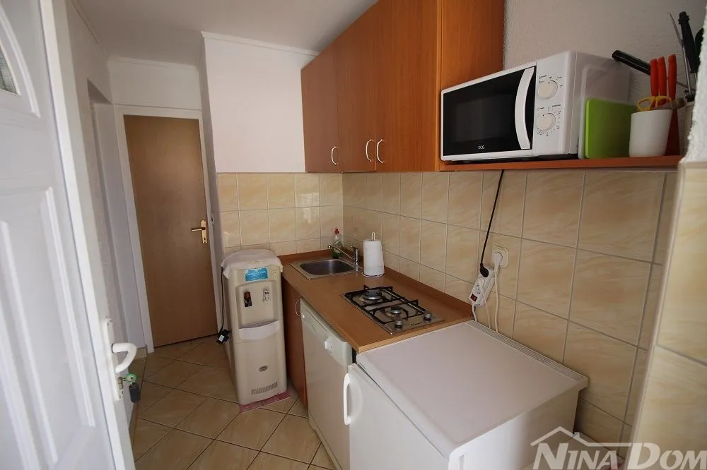 samostojeća nekretnina s 4 manje stambene jedinice. - slika 11