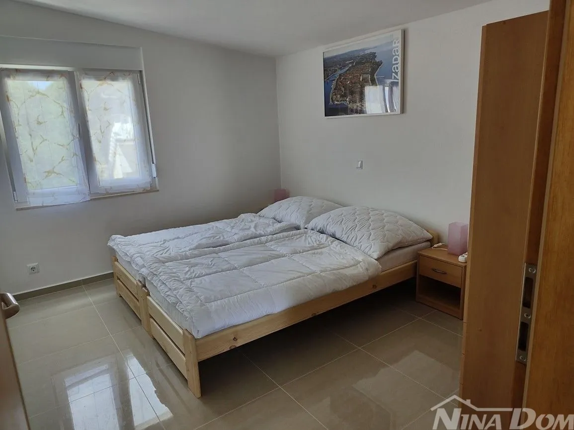 nekretnina s dva stana, južna strana vira 300 met.do mora. - slika 8
