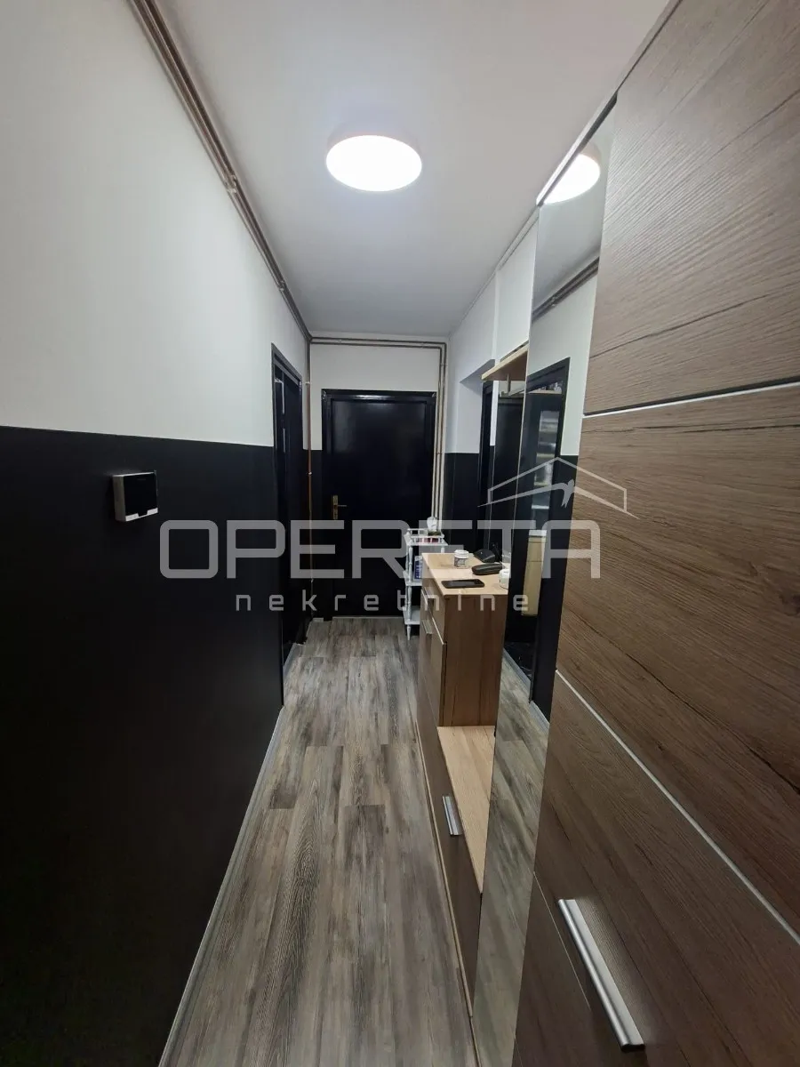 prodaje se novo uređen i potpuno namješten 2-soban stan - slika 12