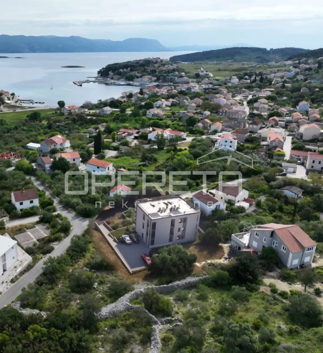građevinsko zemljište 930 m2 s dozvolom za 6 stanova, lumbarda - slika 10