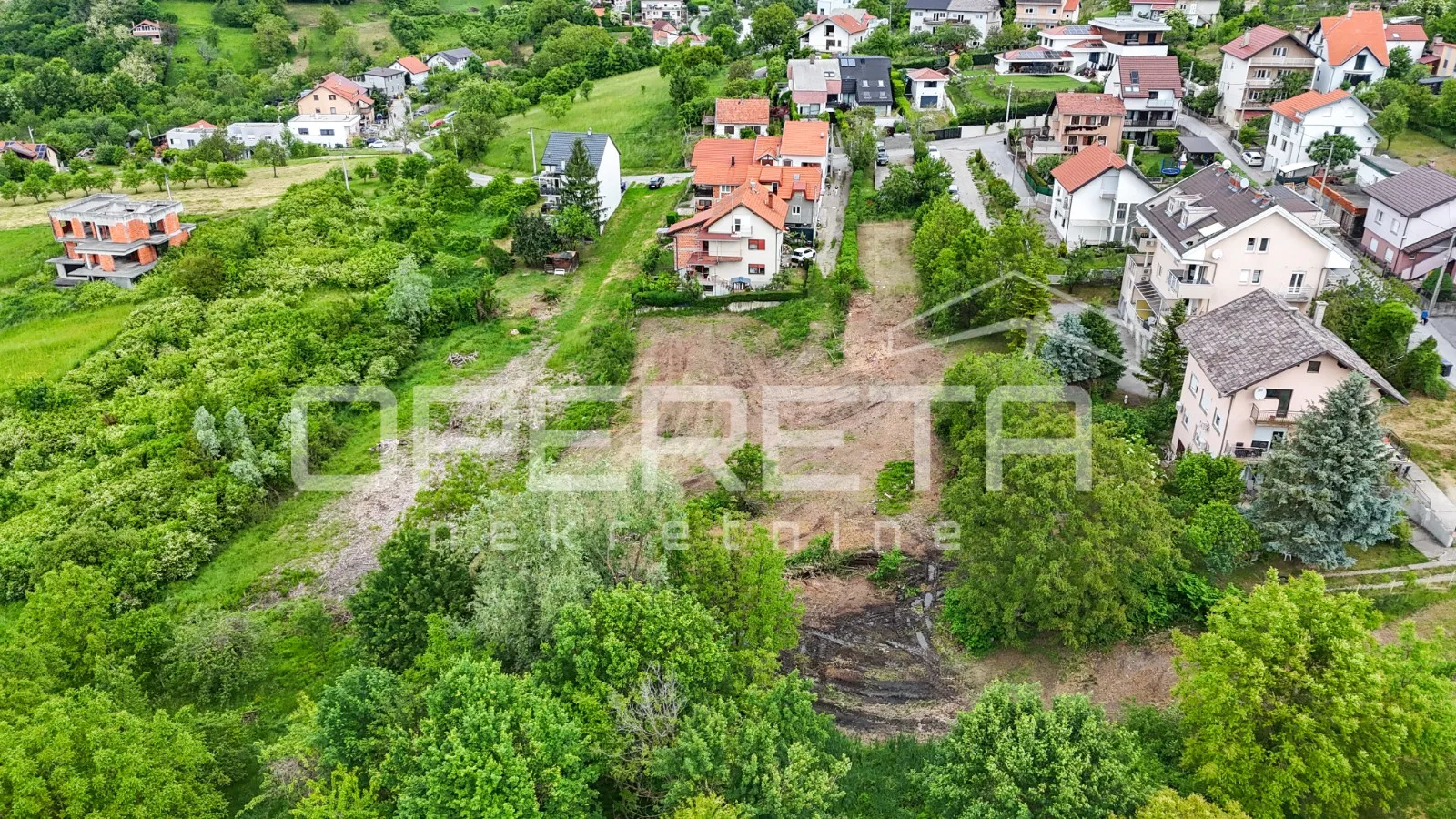 građevinsko zemljište s idejnim projektom za četiri zgrade s po dva stana, črnom - slika 13