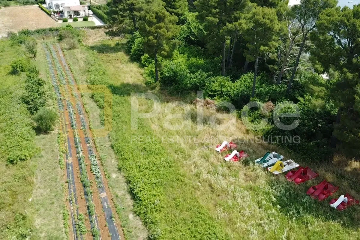 građevinsko zemljište, prvi red uz more 1893 m2 - slika 7
