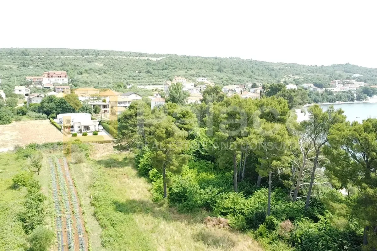 građevinsko zemljište, prvi red uz more 1893 m2 - slika 6
