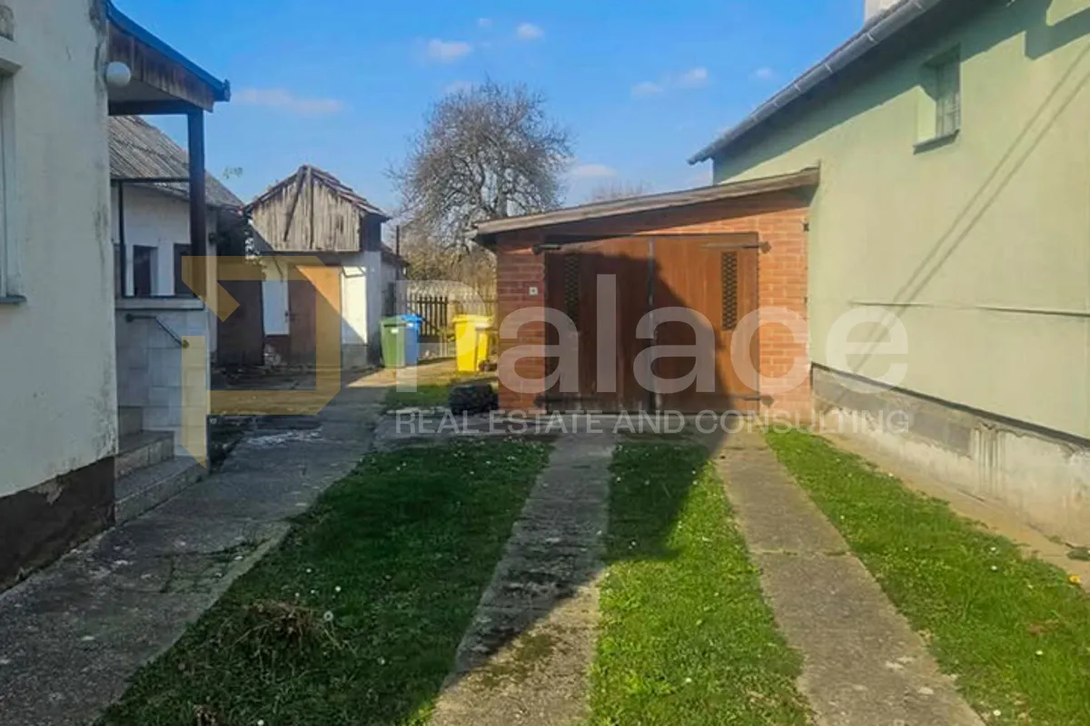 miran dom u valpovu s velikim zemljištem - slika 14