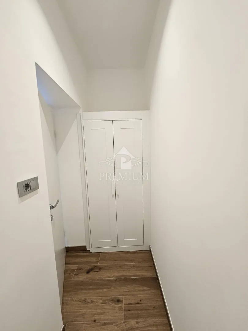 stan 87 m2, dugoročni najam, parking - slika 11