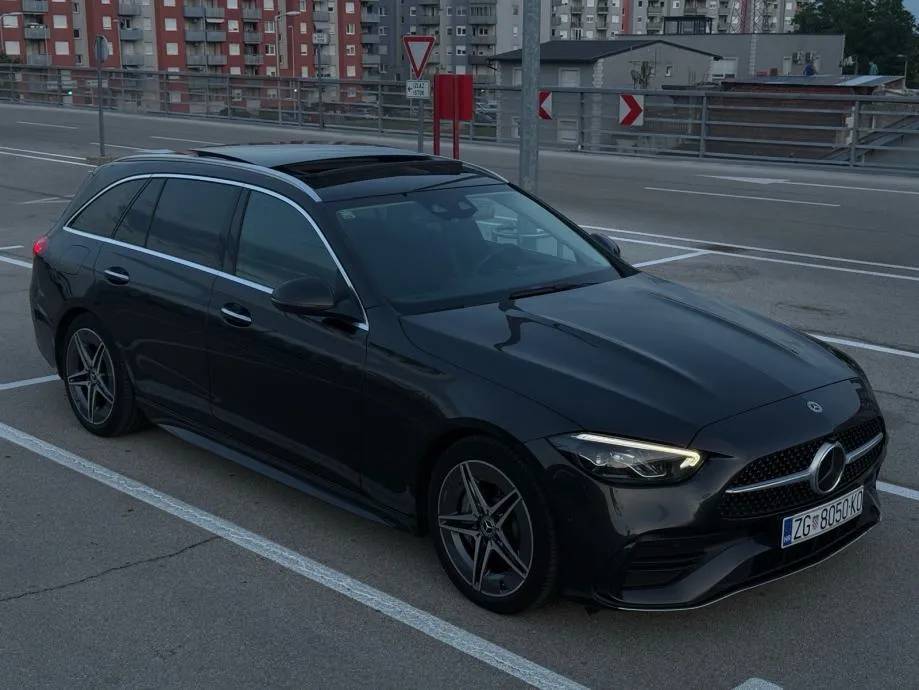 mercedes-benz c200d t amg line *pano, vrhunsko stanje, 2 seta kotača* - slika 3