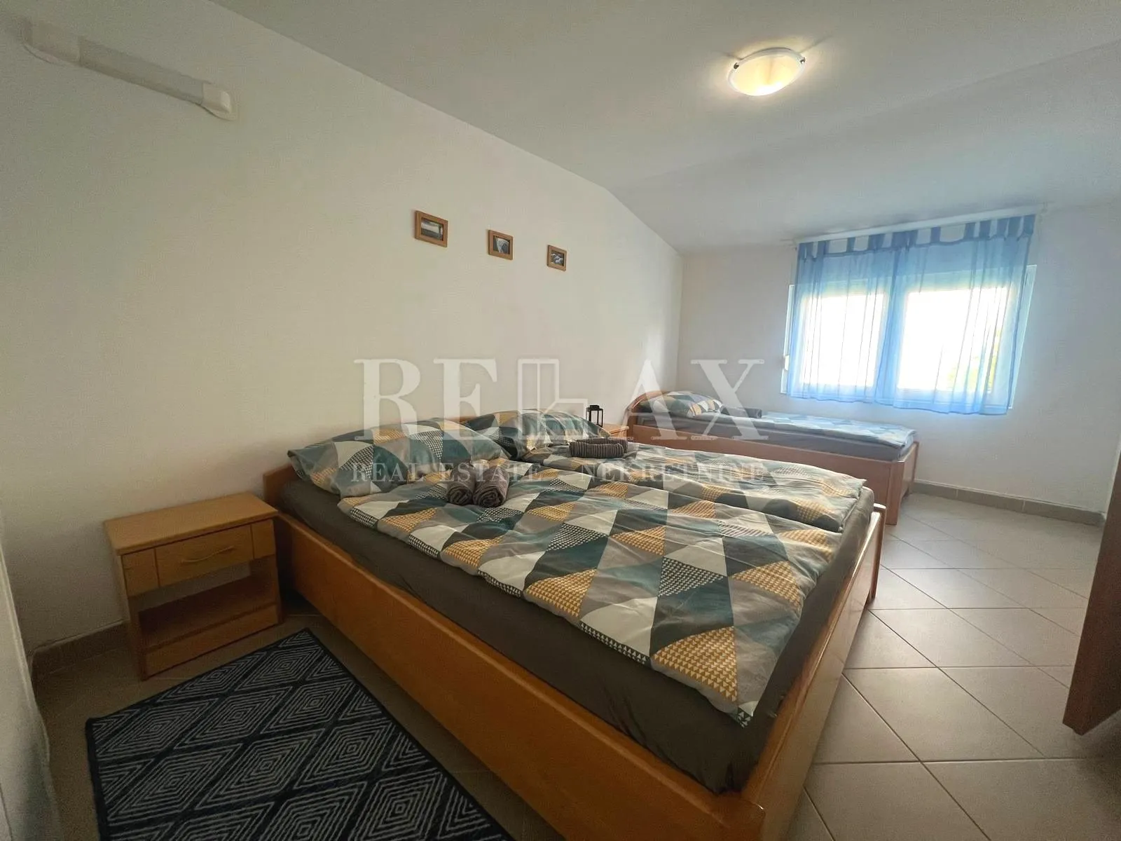 crikvenica - etaža sa tri apartmana u centru grada - slika 25