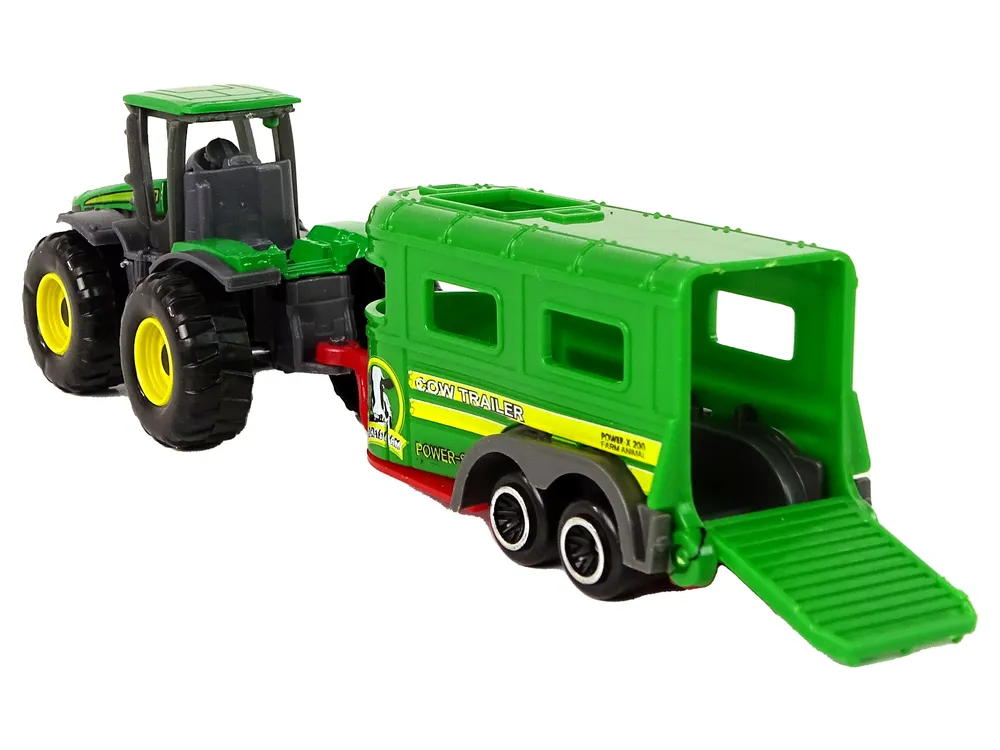 zeleni traktor s prikolicom za prijevoz stoke - slika 4