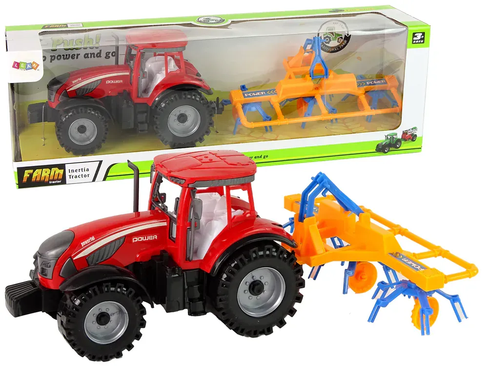 crveni traktor s grabljama - slika 2