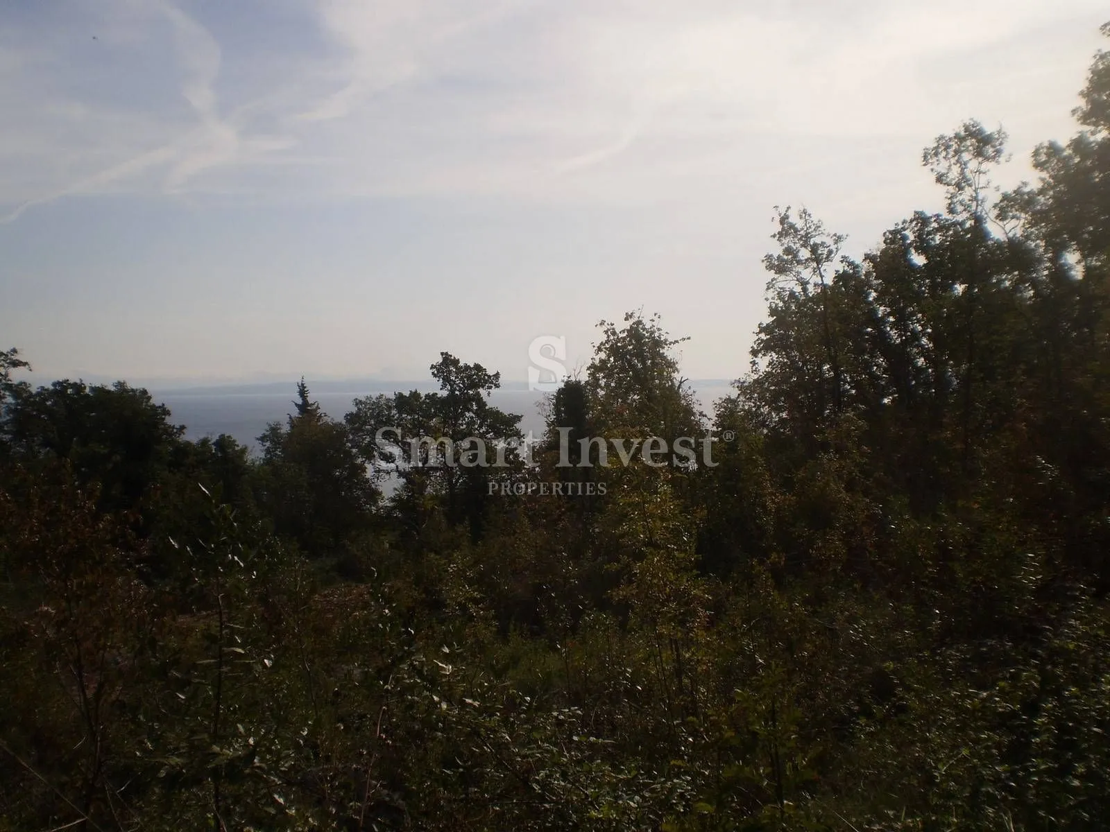 LOVRAN, građevinsko zemljište od 689 m2 s pogledom na more