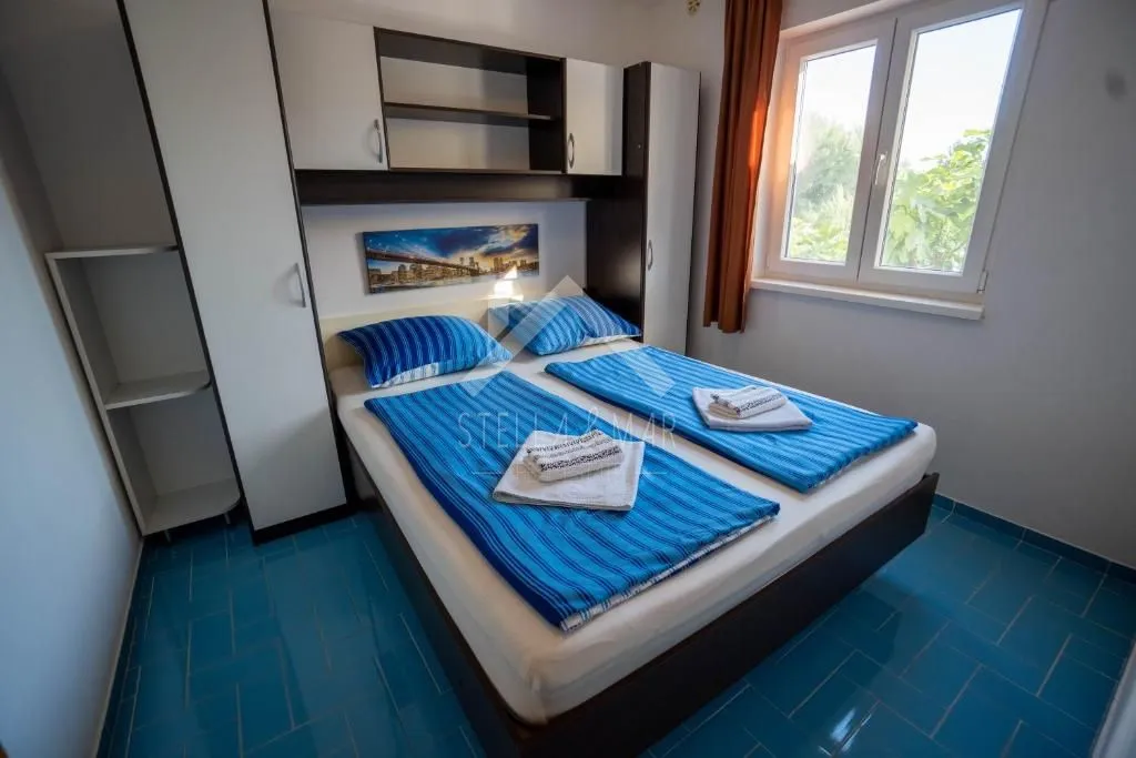 samostojeća kuća sa 5 apartmana - vir - slika 24