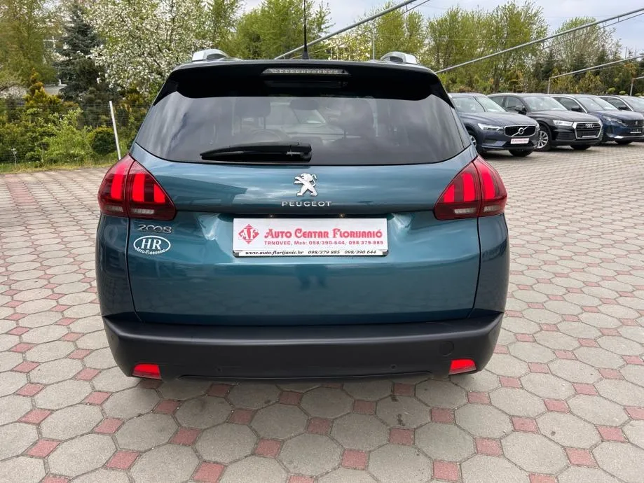 peugeot 2008 1,2 benzin 2018.,allure, reg:17.01.2027.,servisna, navi - slika 6